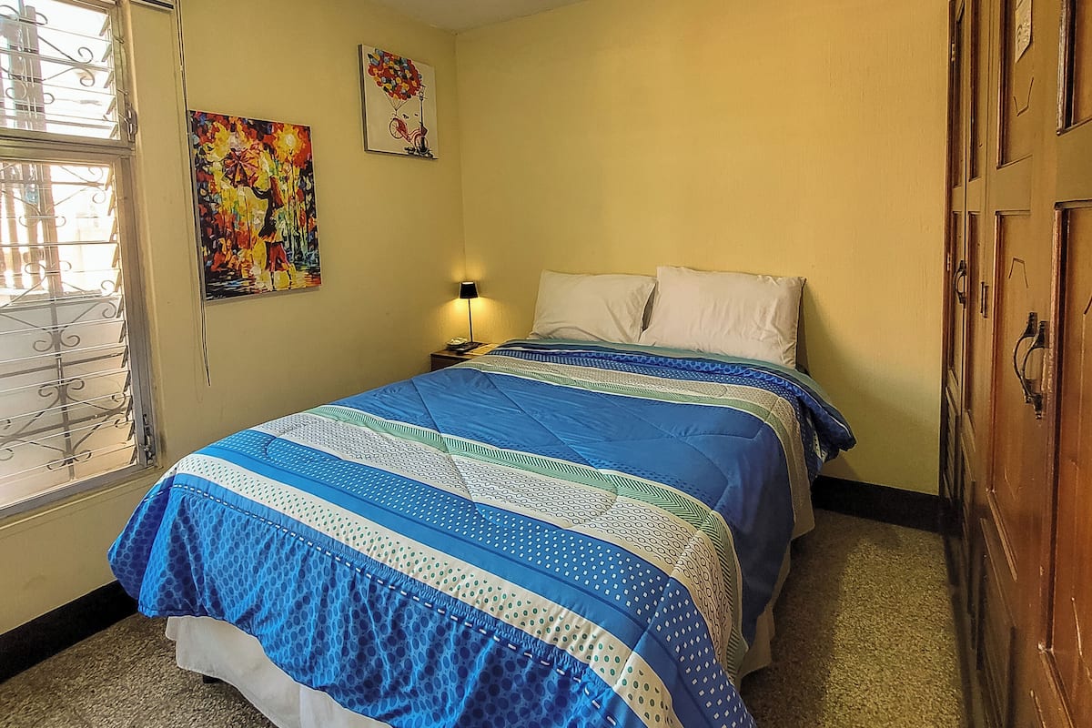 Basic Double Room, 1 Queen Bed, Shared Bathroom