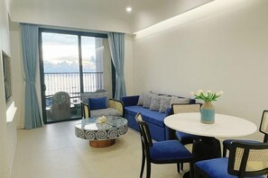 Living area - We Young Apartments by HOFs - Fireworks & Ocean view (Phu Quoc Island)