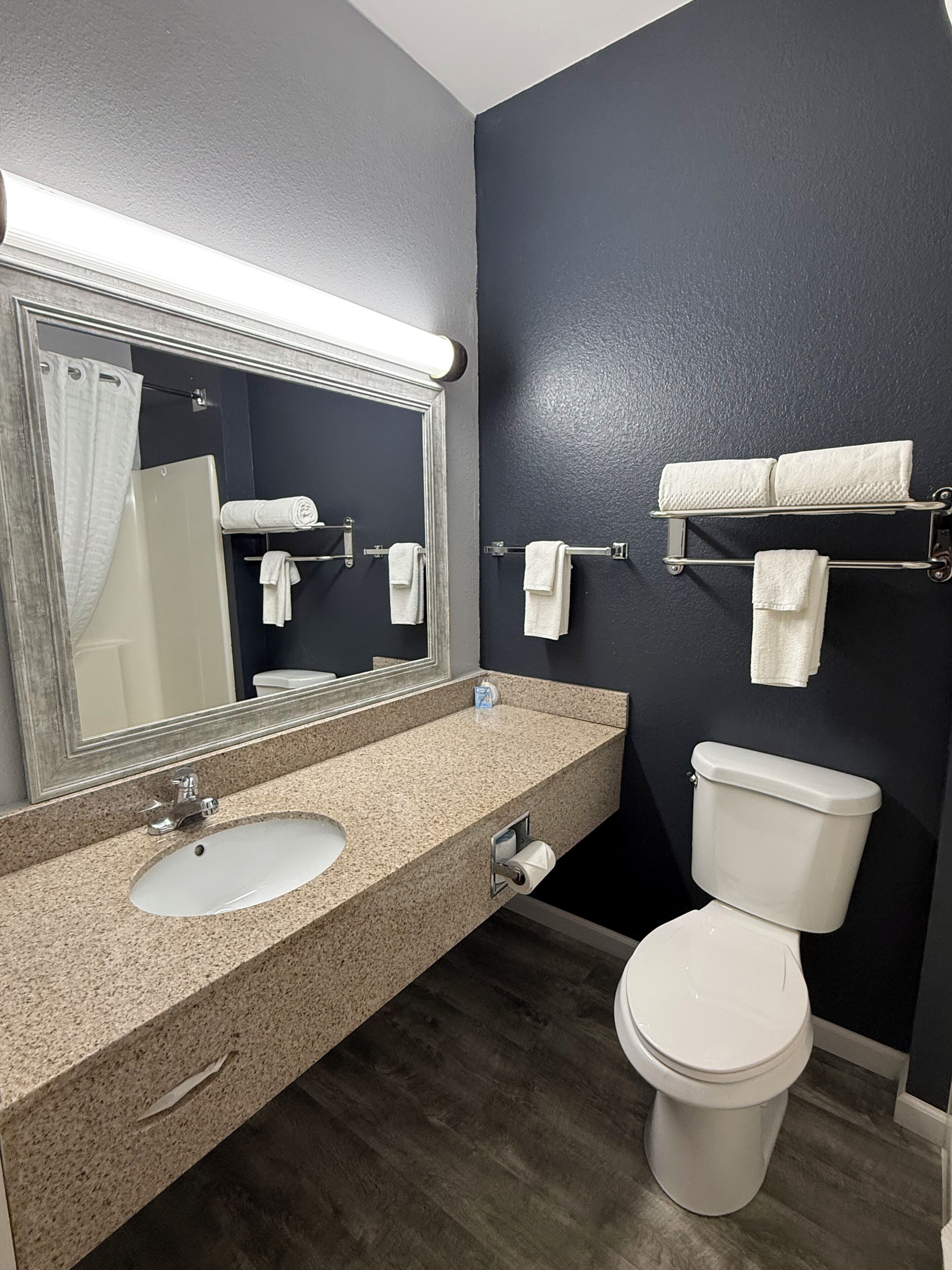 Desk, laptop workspace, blackout curtains, iron/ironing board