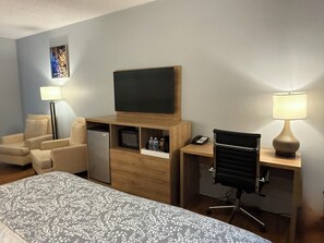 Desk, laptop workspace, blackout curtains, iron/ironing board