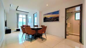 Deluxe Apartment, Balcony, Bay View | Living area | 55-inch Smart TV with digital channels - Bay Win La.mer Butik (Kota Kinabalu)