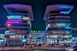 A modern building with the sign 'GALACITY' prominently displayed. - Gala Residences @ Galacity (Kuching)