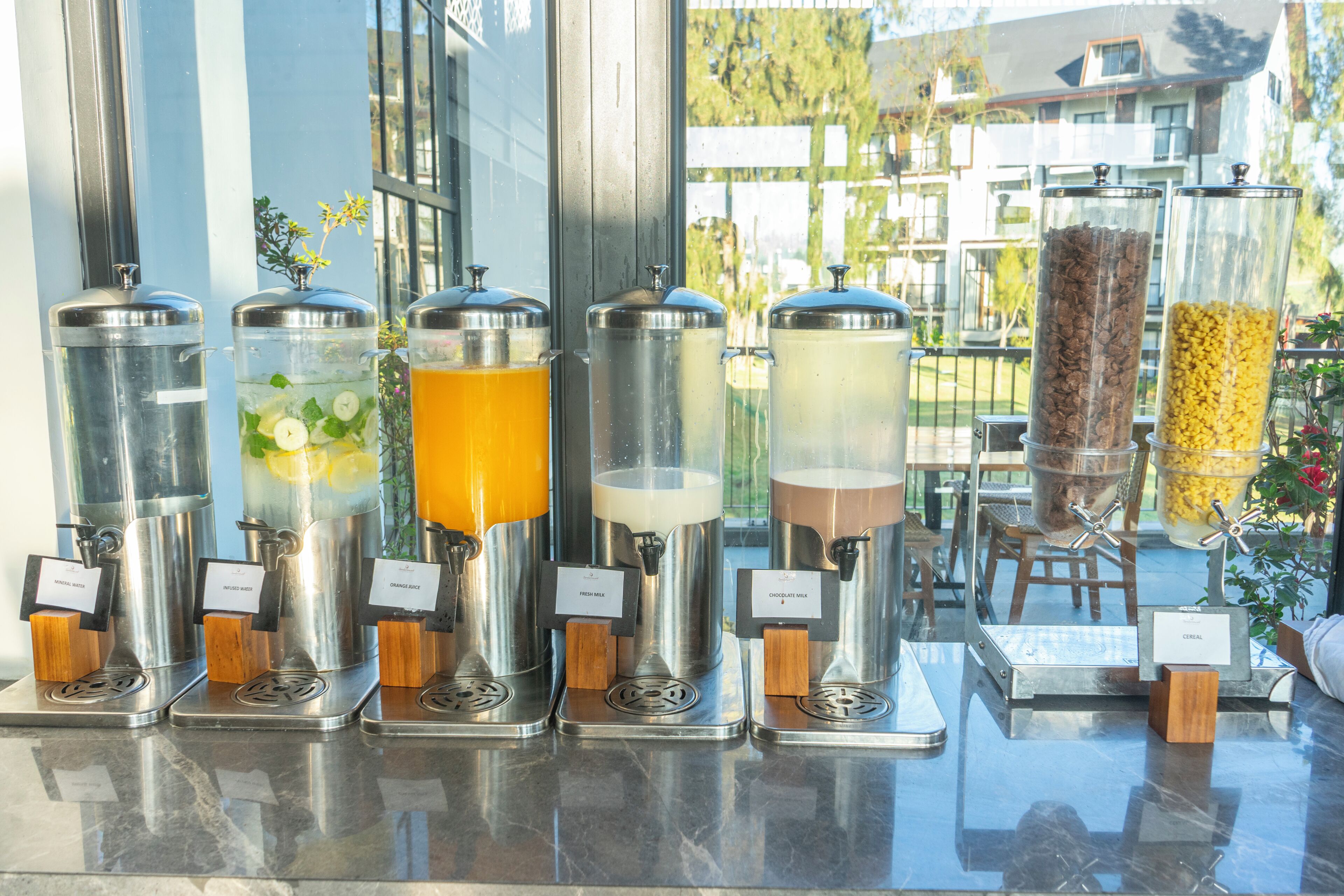 A beverage dispenser with various drink options.