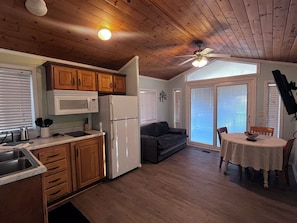 Fridge, microwave, stovetop, coffee/tea maker