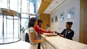A reception area with a marble counter, glass doors, and framed pictures on the wall. - Gulf Inn Hotel Al Nasr, Bur Dubai (Dubai)
