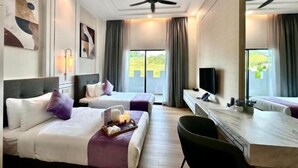 A hotel room with two beds, a desk, a chair, a ceiling fan, and a large window with curtains. - Cameron Lavender Mansion (Brinchang)