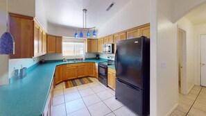 Coffee/tea maker, fridge, microwave, oven
