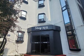 A building with a sign that reads 'Stay'. - Stay plan (Incheon)