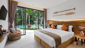 A bedroom with a large bed, a view of a swimming pool, and a wooden headboard. - Villa Arcadia by BaliSuperHost (Bali)