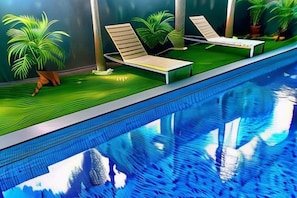 A swimming pool with lounge chairs and potted plants. - JJH Serviced Apartments Near Serangoon MRT (Singapore)
