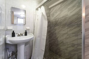 Hair dryer, towels, soap, shampoo