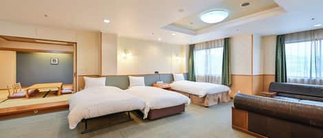 Suite traditionnelle, non-fumeur | Coffre-fort, accĂšs au Wi-Fi (inclus), literie fournie