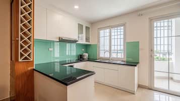 Family Triple Room, Non Smoking, Kitchen | In-room safe, desk, laptop workspace, blackout drapes