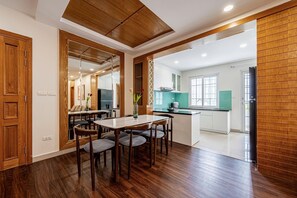 Family Triple Room, Non Smoking, Kitchen | In-room safe, desk, laptop workspace, blackout drapes