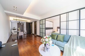 Superior Apartment, 1 Bedroom, Kitchen, City View | Living room | Smart TV