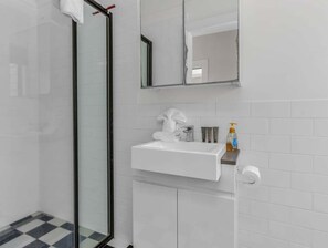 Hair dryer, towels, soap, shampoo