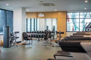A gym with treadmills, dumbbells, and exercise equipment. - Comfy & Stylish Suasana Suites JB City, Next to Komtar JBCC (Johor Bahru)