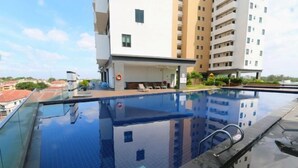 A rooftop pool with a clear view of surrounding buildings. - PD D’Wharf Seaview & Sunset Suite (up to 6 Pax) (Port Dickson)