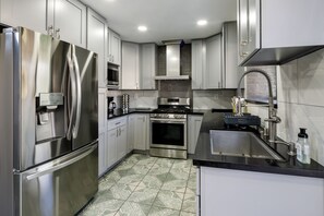Coffee/tea maker, fridge, microwave, oven