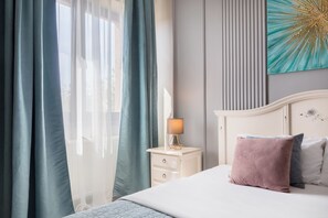 Appartement Deluxe, balcon, vue ville | Literie de qualité supérieure, matelas mémoire de forme