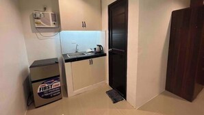 Unclassified image, 4 of 17, button - Cozy Studio Type unit w/ TV, Wifi, hotshower & ref (Cotabato)