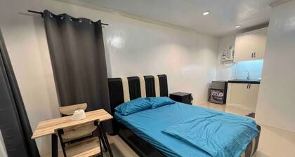 Cozy Studio Type unit w/ TV, Wifi, hotshower & ref