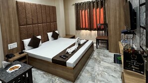 Habitación de lujo, vistas a la ciudad | Wifi gratis y ropa de cama