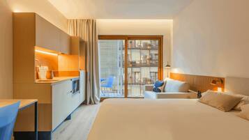 Comfort Room, 1 Double Bed, Balcony | In-room safe, desk, laptop workspace, blackout drapes