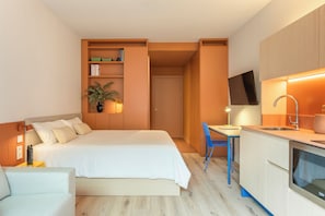 Comfort Studio, 1 Queen Bed with Sofa bed, Balcony | In-room safe, desk, laptop workspace, blackout drapes