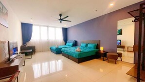 A modern hotel room with a large bed, a desk, a chair, and a TV. - GYDEN STAYCATION #The Straits Johor Bahru (Johor Bahru)