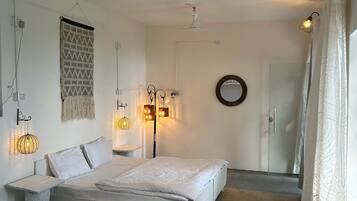 Desk, laptop workspace, blackout drapes, iron/ironing board