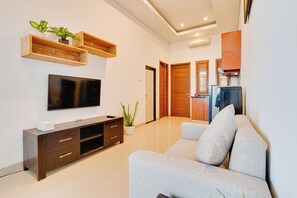 Villa, Patio, Pool View | Living area | 43-inch Smart TV with digital channels, Netflix, streaming services - Villa Ganesha - Canggu (Kerobokan)