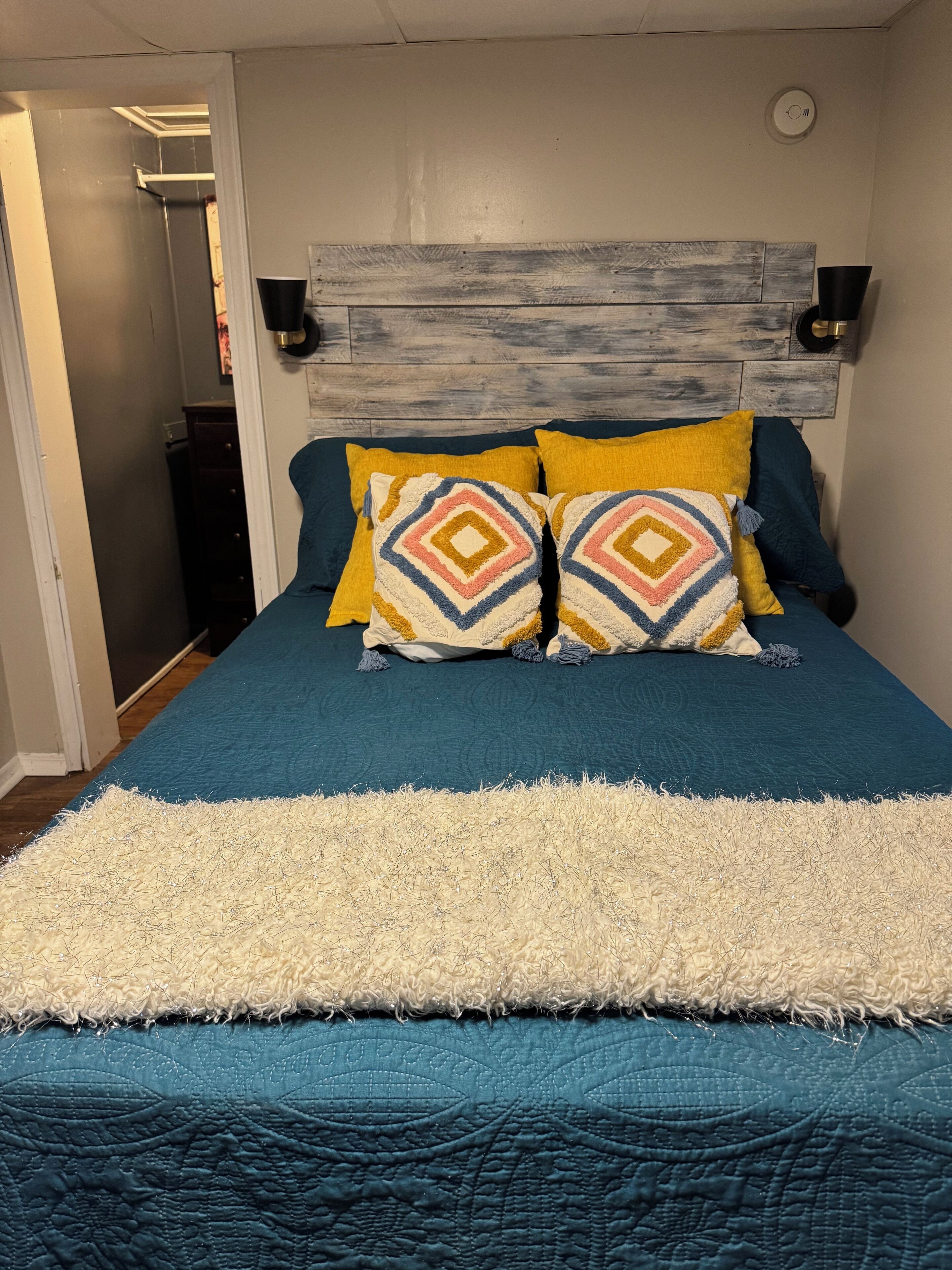 1 bedroom, desk, iron/ironing board, travel crib