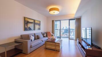 Lägenhet Superior - 2 sovrum - kök - utsikt mot staden | Vardagsrum | Smart-tv