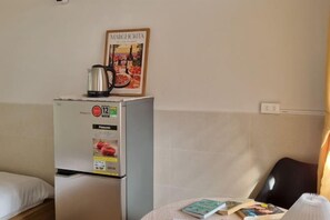 Tabla de planchar con plancha 