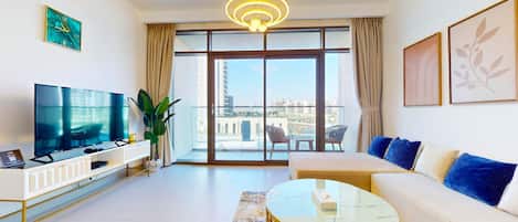 Deluxe Apartment, Balcony, City View | Living area | 55-inch Smart TV with digital channels