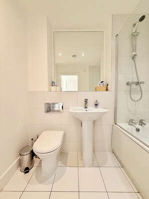 Hair dryer, towels, soap, toilet paper