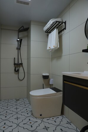Room, River View | Bathroom | Shower, hair dryer, towels