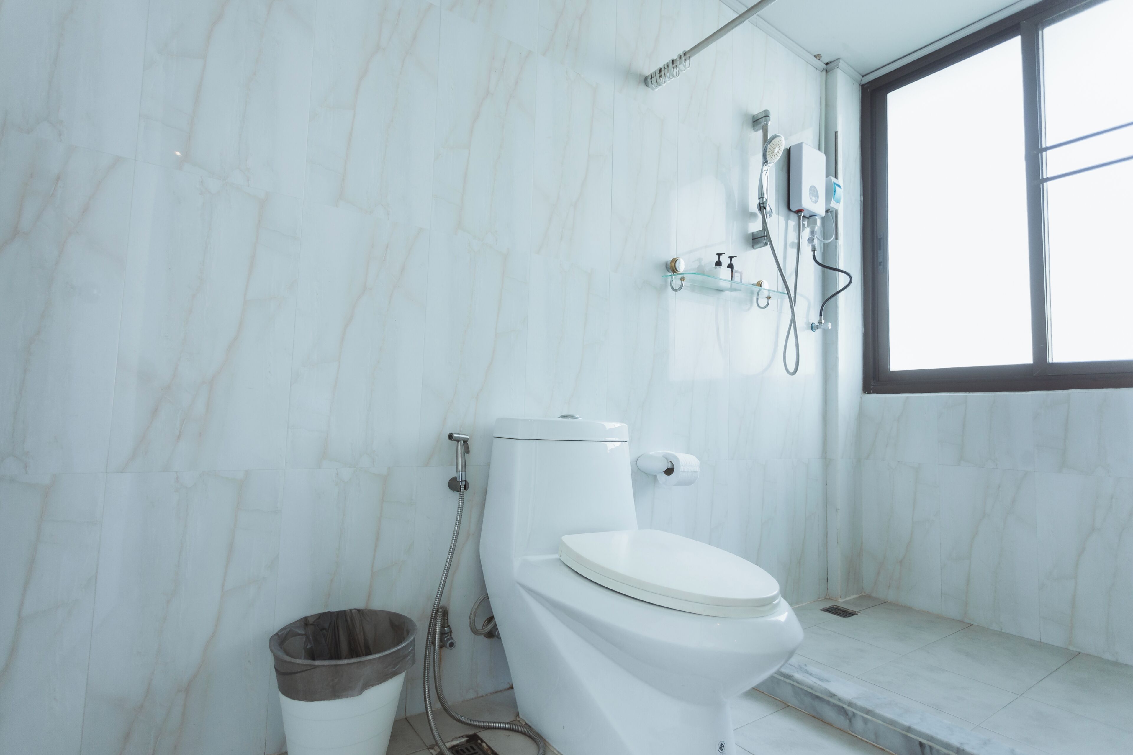 Double Room | Bathroom | Shower, towels, soap, shampoo