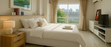 Tabla de planchar con plancha, wifi y ropa de cama