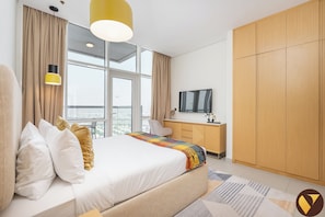 Luxury Apartment, Balcony, City View | Egyptian cotton sheets, premium bedding, in-room safe - Vogue | Novotel JVT near Springs Souk Mall (Dubai)
