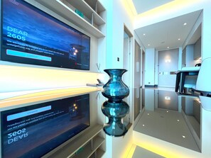 Coffres-forts dans les chambres, fer et planche à repasser