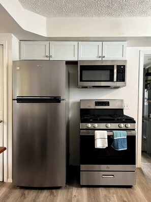 Fridge, microwave, oven, stovetop - Renovated 3BR Home w/ Parking & Pet-Friendly (Madison Heights)