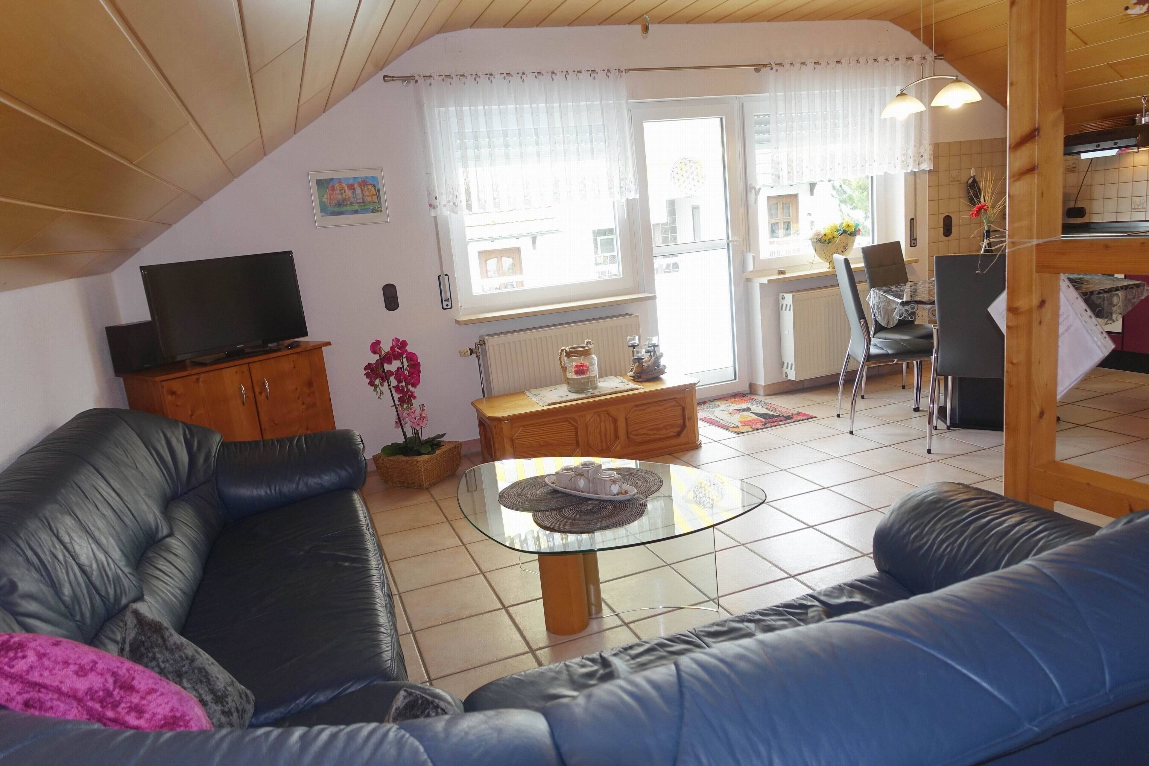 Fernseher, DVD-Player, Bücher, Stereoanlage