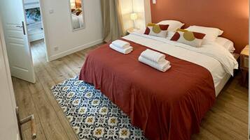 2 slaapkamers, een strijkplank/strijkijzer, gratis wifi, beddengoed