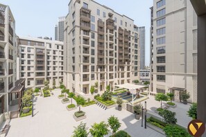 Departamento de lujo, balcón, vista a la alberca | Tabla de planchar con plancha, cunas, wifi gratis y ropa de cama 