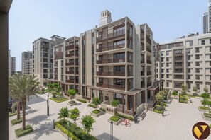 Luxury Apartment, Balcony, Pool View | Iron/ironing board, cots/infant beds, free WiFi, bed sheets - Vogue Rosewater Creek Beach Stylish 2BR (Dubai)