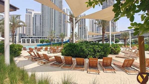 Luxury Apartment, Balcony, Pool View | Iron/ironing board, cots/infant beds, free WiFi, bed sheets - Vogue Rosewater Creek Beach Stylish 2BR (Dubai)