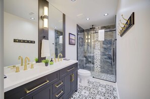 Shower, eco-friendly toiletries, hair dryer, towels