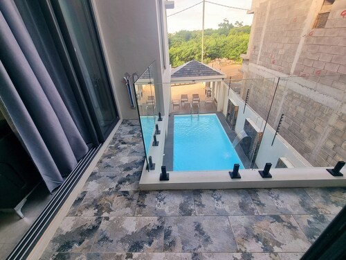 Serenity I Villa : 4 Ensuite Bedrooms, Heated Pool Feature & Cozy Living Spaces.